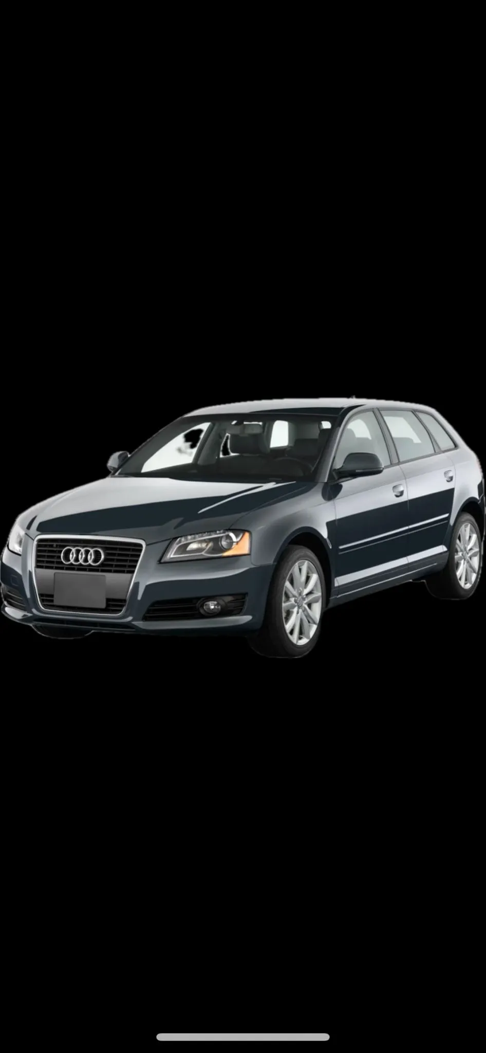 a gray car on a black background